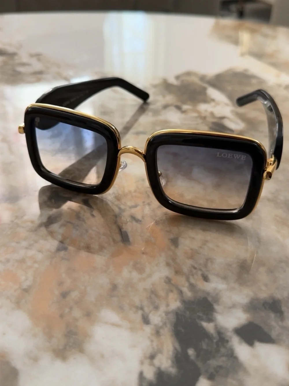 Loewe Black Sunglasses with Gold Accents and Gradient Lenses
